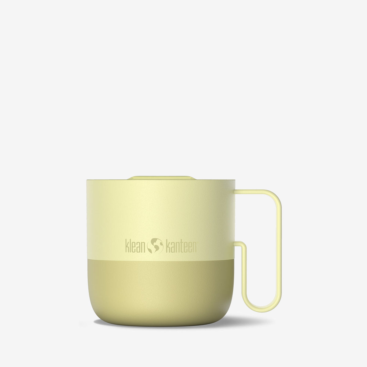 A Klean Kanteen insulated mug in a pale yellow-green color, featuring a matte finish, a matching handle, and a lid, set against a plain light gray background.