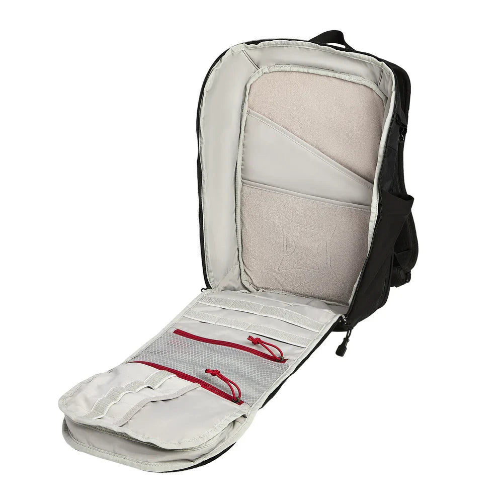 Backpack with a seat pad and red straps on a white background