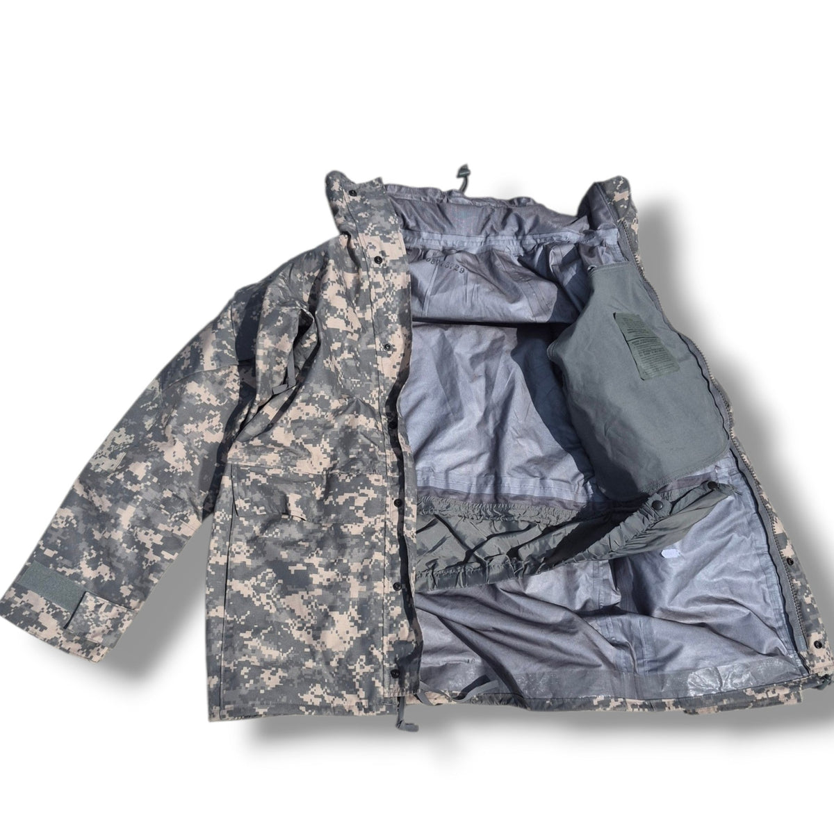 Camouflage jacket with a gray interior on a white background