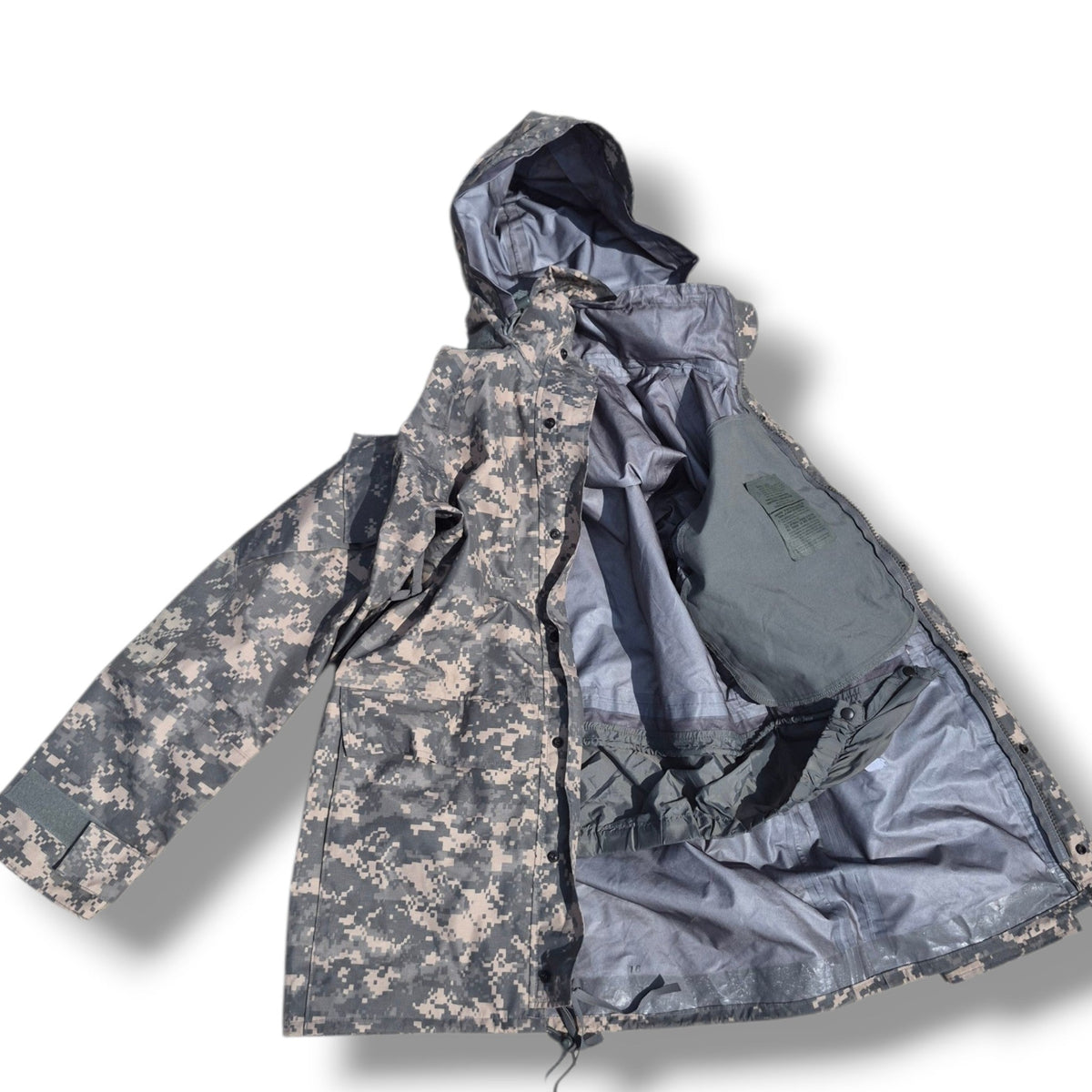 Camouflage jacket with a hood on a white background