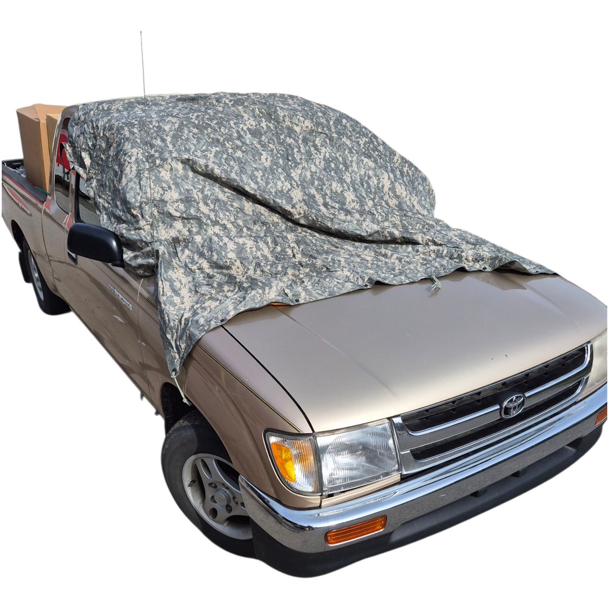 Camouflage cover on a truck bed with a white background